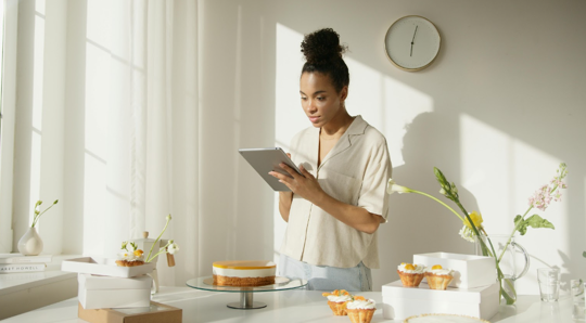 Woman on tablet - sales tax helper