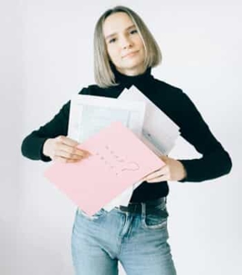 woman figuring out papers - sales tax helper